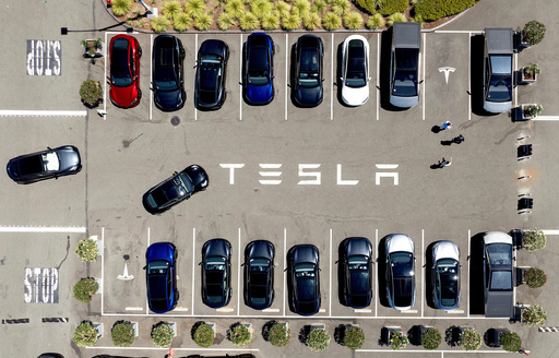 Parents of college student killed in Tesla crash allege design flaw trapped her in the burning car