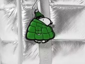Kate Spade Outlet just added a Snoopy snow charm to its Peanuts collection and this famous beagle is a beaut