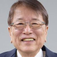 'Stealth husband' of Japan's new PM vows quiet support