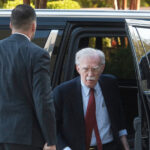 Former national security adviser John Bolton pleads not guilty to sharing government secrets