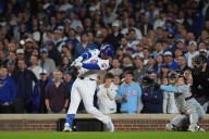 Ian Happ's homer sets the tone for the Cubs in a playoff victory against the Brewers