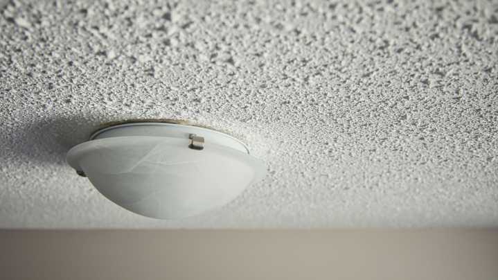 Before Skim Coating Your Old Popcorn Ceiling, Watch Out For These Sneaky Drawbacks