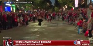 Jocko talks with member of Gymnastics Club during parade