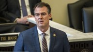Oklahoma’s GOP governor speaks out against Texas troops in Illinois