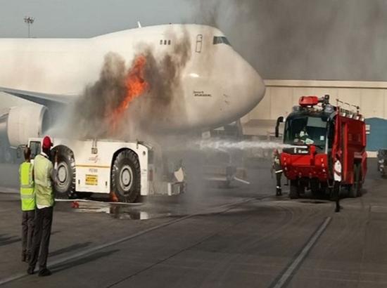 Air India bus catches fire at Delhi Airport Terminal 3 Photo Source: ANI [ FULL VIEW ]