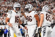 Flacco rallies Bengals past Rodgers and Steelers 33-31 in battle of 40
