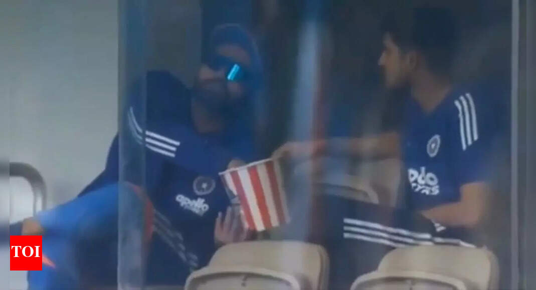 Rohit Sharma and Shubman Gill caught munching popcorn during rain delay
