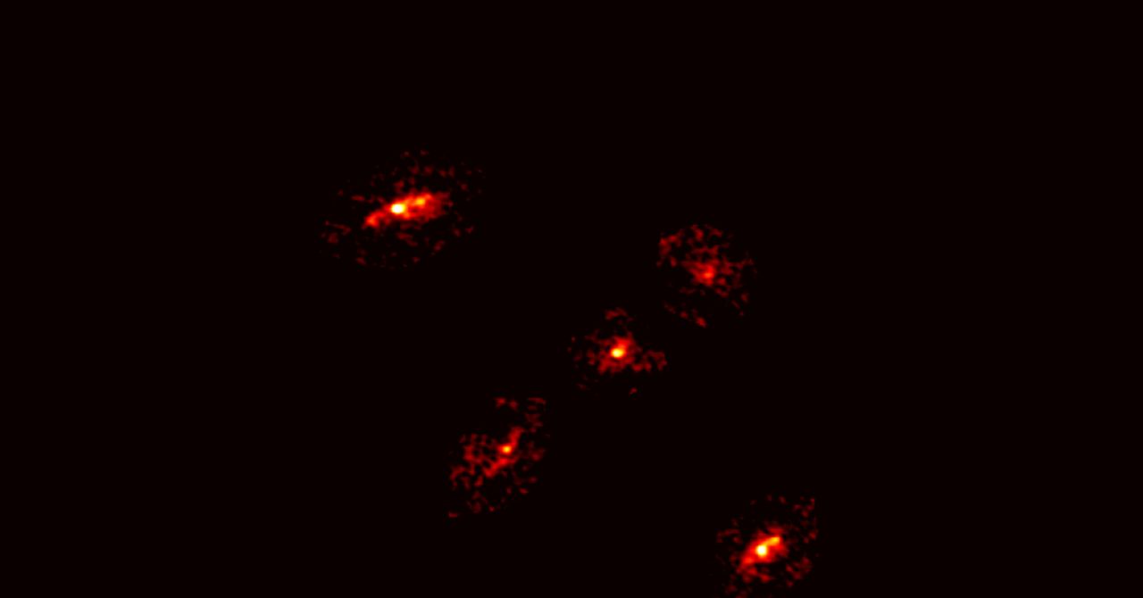 A Newly Discovered ‘Einstein’s Cross’ Reveals the Existence of a Giant Dark Matter Halo