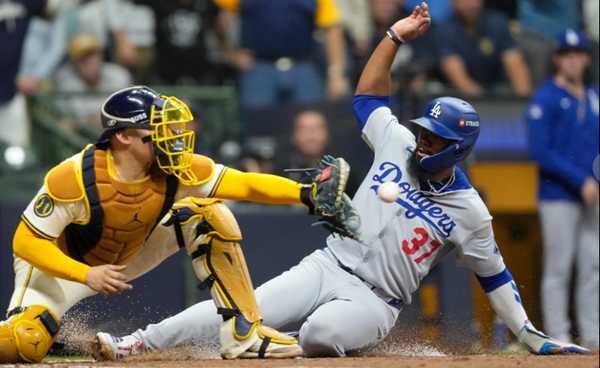 Dodgers escape Brewers 2-1 on Snell gem
