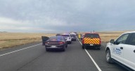 At least one person killed in head-on crash with garbage truck