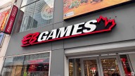 EB Games holding Pokémon pop