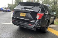 Officer hospitalized after car crashes into police vehicle in North Portland