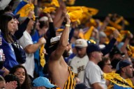 Viral ‘Milwaukee Brewers Karen’ Tries to Scare US War Veteran With ICE at Dodgers Game