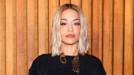 Rita Ora just styled her bleached blonde bob with the most plunging dress we’ve ever seen