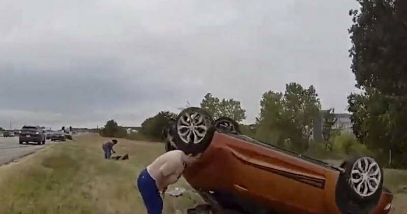 Video shows dramatic rescue of baby pinned by car in US