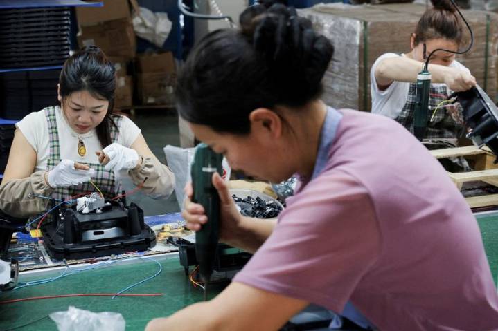 China factory activity shrinks for seventh month in October, PMI shows