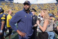 Michigan and coach Moore drop appeal of NCAA penalties from sign
