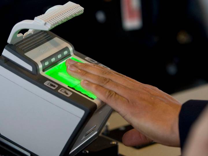 What is biometric data and what countries require visitors to give it?