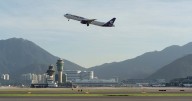 Cargo aircraft skids off Hong Kong runway, killing 2