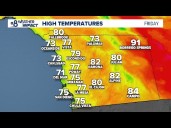 Expect a few remaining sprinkles along the coast and inland Friday