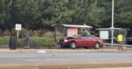 Police: Car jumps curb, injures two people waiting at bus stop on York Road