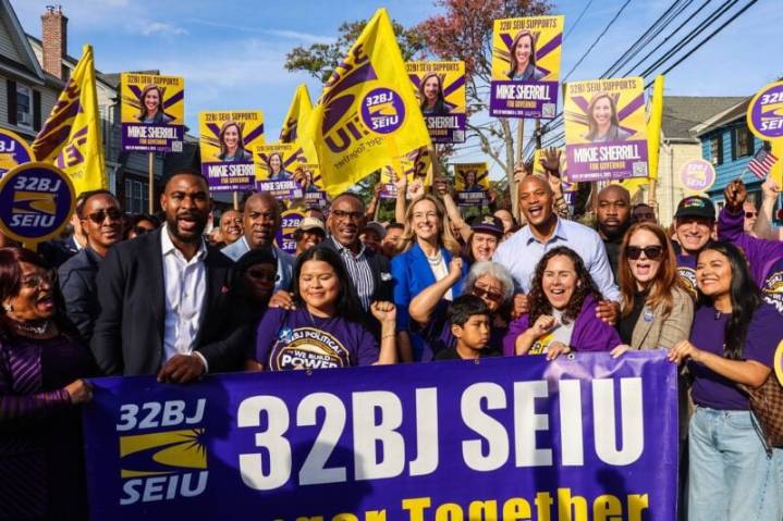 Wes Moore and Mike Sherrill go door to door with Defund the Police organizer Chigozie Onyema in Newark