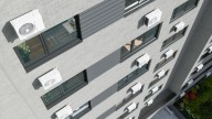 El BOE prohíbe instalar aires acondicionados sin autorización en las fachadas de las viviendas