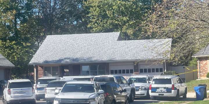 Coroner on scene of police investigation at Lexington home
