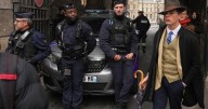 Inspector Clouseau? The mystery man in an AP photo after the Louvre jewel heist creates a buzz