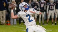 Who is Inland Lakes football's first-round playoff opponent?