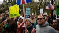 Thousands take to Vermont streets, greens to again protest Trump