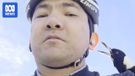 Canberra cyclist captures 'incredible' moment magpie plucks earphone from his ear on camera