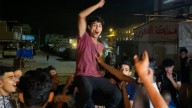 Palestinians in Gaza celebrate news of ceasefire deal