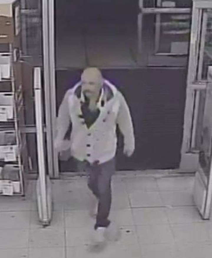 Police: Child reports man took photos of her in bathroom stall; suspect sought