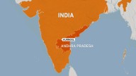 At least 25 killed in India after bus catches fire in crash with motorcycle