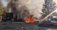 Firefighters battle RV inferno near Hwy 291