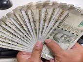 Rupee rises 9 paise to close  at 87.93 against US dollar