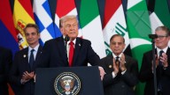 Trump’s week wraps with another political foe indicted, a continued shutdown and a visit to the Middle East