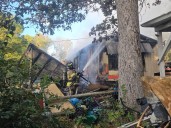 Firefighters battle blaze near Chain of Lakes
