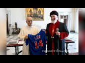 Pope Leo appears to receive Cubs jersey from Assyrian church leader