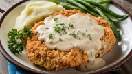 The Lean Cut Of Beef Texas Roadhouse Uses For Its Country Fried Steak