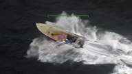Royal Marine sniper makes ‘bulleyse’ shot on £35m drug boat flying backwards from helicopter