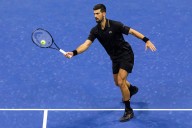 Deadspin | Jannik Sinner forced to retire in Shanghai; Novak Djokovic advances