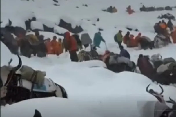 Rescuers finally reach last 200 hikers 16,000ft up on Everest after they were trapped in brutal snowstorm