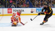 Canucks score 4 in 3rd, defeat Flames in Foote’s coaching debut