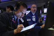 Wall Street edges back from its records after gold tops $4,000 per ounce