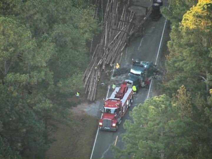 Crews work to clean up after log truck overturns in Durham County