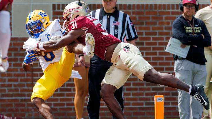 Freshman quarterback tosses 2 TDs as Pitt upsets No. 25 Florida State