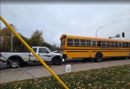 Truck collides with school bus in Hermantown