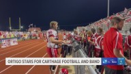 Carthage's Tyler Ortigo leads on the field and in the band
